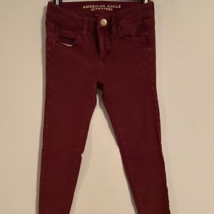 AE Outfitters maroon soft stretch jeans.